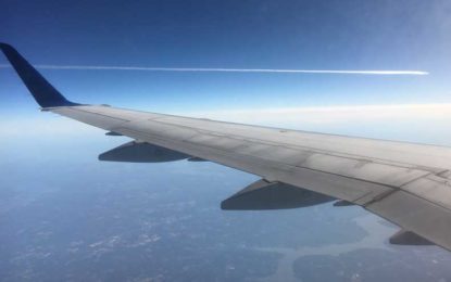 airplane-in-distance-at-35k-feet-415×260
